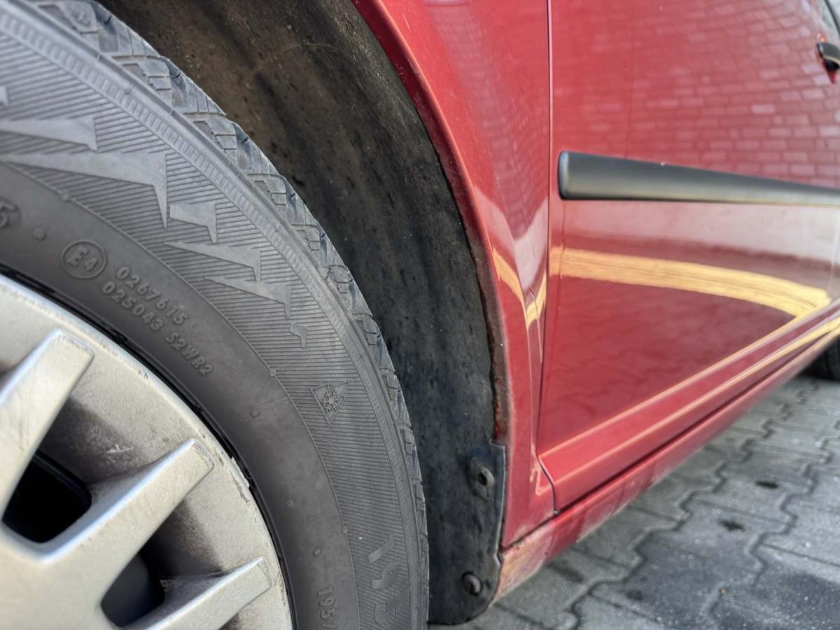 VW Golf 4 original Kotfl&uuml;gel vorn links LC3K Canyonred Bj.2000